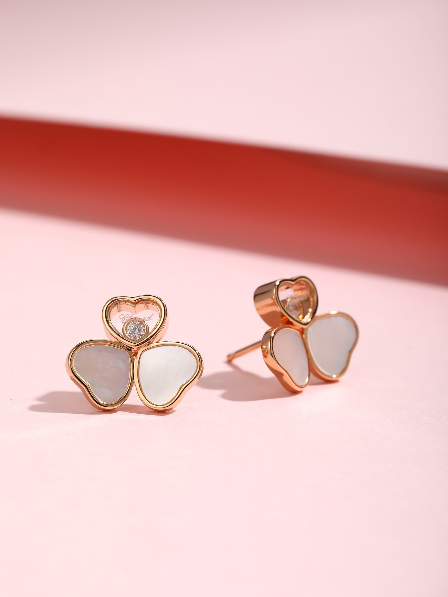 Rose gold three-dimensional three petal mother of pearl shell earrings EHA150