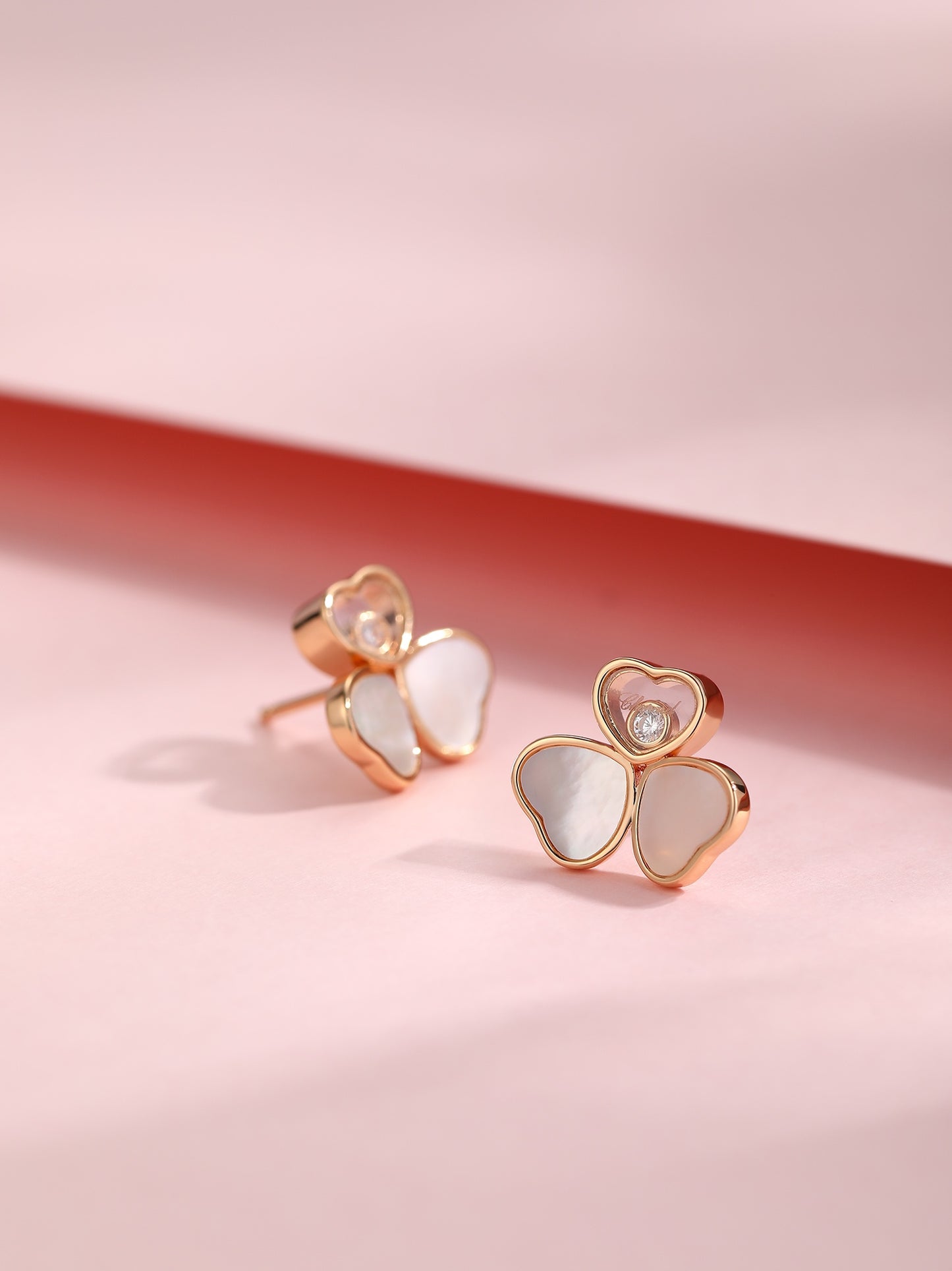 Rose gold three-dimensional three petal mother of pearl shell earrings EHA150