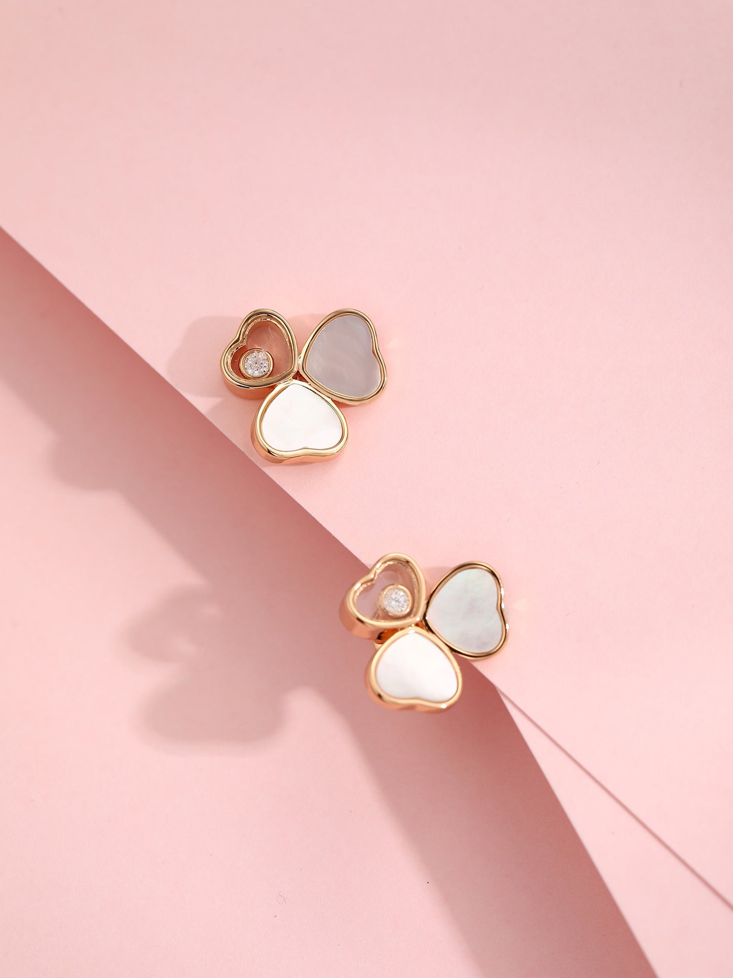 Rose gold three-dimensional three petal mother of pearl shell earrings EHA150