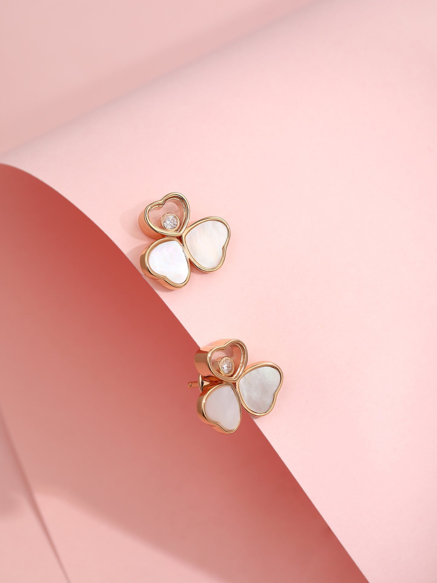 Rose gold three-dimensional three petal mother of pearl shell earrings EHA150