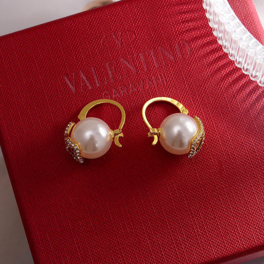 Versatile gold pearl earrings EHA493